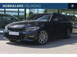 Zwart, metallic lak Gebruikt 2022 BMW 330 Executive Stationwagen | € 39.450 (Eerlijke prijs)