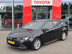 Zwart Gebruikt 2024 Toyota Corolla Hybrid Active Stationwagen | € 28.900