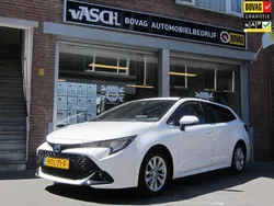 Wit Gebruikt 2023 Toyota Corolla Hybrid Active Stationwagen | € 26.450