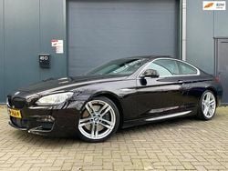 Zwart (metallic) Gebruikt 2012 BMW 650 Executive Coupé | € 24.994 (Eerlijke prijs)
