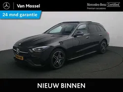 Zwart, metallic lak Gebruikt 2022 Mercedes C300e AMG line Stationwagen | € 42.945 (Eerlijke prijs)