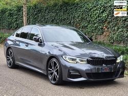 Grijs Gebruikt 2021 BMW 330 M Sport Sedan | € 31.000 (Goede deal)