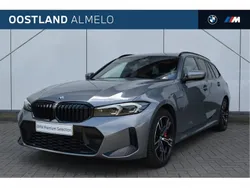 Skyscraper grey (grijs metallic) Gebruikt 2024 BMW 330e Comfort Edition Stationwagen | € 51.950 (Super prijs)