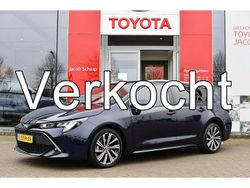 Blauw, metallic lak Gebruikt 2021 Toyota Corolla Stationwagen | € 23.499 (Eerlijke prijs)