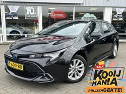 Zwart Gebruikt 2023 Toyota Corolla Hybrid Active Stationwagen | € 28.900