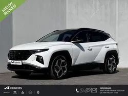 Atlas white solid / phantom black Gebruikt 2022 Hyundai Tucson Premium SUV | € 33.435 (Eerlijke prijs)