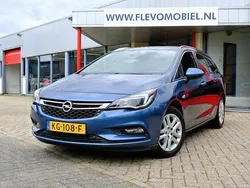 Blauw, metallic lak Gebruikt 2016 Opel Astra Business Stationwagen | € 10.450 (Eerlijke prijs)