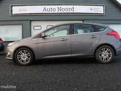 Bruin Gebruikt 2012 Ford Focus Titanium Hatchback | € 1.770 (Eerlijke prijs)