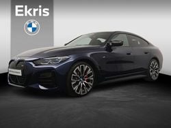 Blauw Gebruikt 2023 BMW i4 Executive Sedan | € 52.900 (Eerlijke prijs)