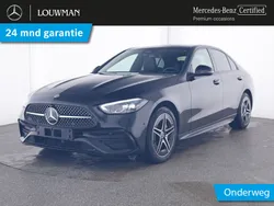 Zwart Gebruikt 2024 Mercedes C300e AMG Sedan | € 49.750 (Super prijs)