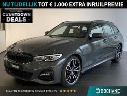 Dravitgrau metallic (c36) Gebruikt 2021 BMW 330e Executive Stationwagen | € 30.450 (Eerlijke prijs)