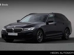 Zwart, metallic lak Gebruikt 2022 BMW 520 Executive Stationwagen | € 38.880 (Goede deal)