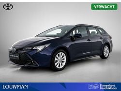 Blauw Gebruikt 2023 Toyota Corolla Hybrid Active Stationwagen | € 25.950 (Eerlijke prijs)