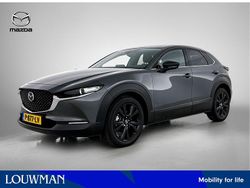 Machine grey (donker grijs metallic) Gebruikt 2022 Mazda CX-30 Homura-Line SUV | € 29.945 (Eerlijke prijs)