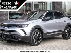 Grijs, metallic lak Gebruikt 2024 Opel Mokka Ultimate SUV | € 26.900 (Eerlijke prijs)