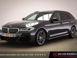 Grijs Gebruikt 2023 BMW 530e M Sport Stationwagen | € 46.945 (Eerlijke prijs)