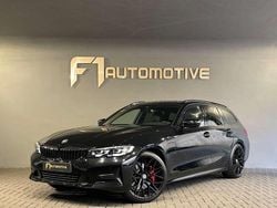 Zwart Gebruikt 2021 BMW 330e Executive Stationwagen | € 29.800 (Goede deal)