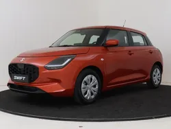 Oranje metallic Nieuw 2024 Suzuki Swift Comfort Hatchback | € 22.299 (Eerlijke prijs)