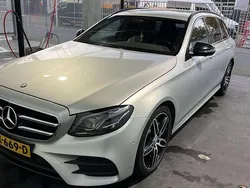 Zilver Gebruikt 2017 Mercedes E220 AMG line Stationwagen | € 21.900 (Eerlijke prijs)