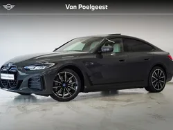 Grijs Gebruikt 2024 BMW i4 Executive Sedan | € 54.895 (Eerlijke prijs)