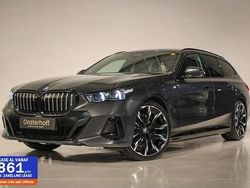 Grijs Gebruikt 2024 BMW 530e M Sport Stationwagen | € 64.990