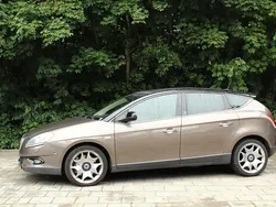 Bruin Gebruikt 2010 Lancia Delta Hatchback | € 3.949 (Super prijs)
