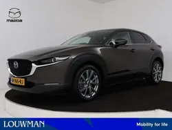 Titanium flash (bruin metallic) Gebruikt 2021 Mazda CX-30 Comfort SUV | € 26.795 (Eerlijke prijs)