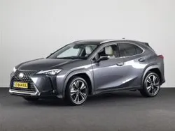 Sonic grey metallic (donker grijs metallic) Gebruikt 2024 Lexus UX 300e Luxury Line SUV | € 49.885
