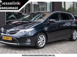 Grijs Gebruikt 2015 Toyota Auris Hybrid Hatchback | € 10.900 (Eerlijke prijs)