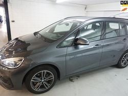 Grijs (metallic) Gebruikt 2022 BMW 218 Executive Stationwagen | € 19.950 (Super prijs)