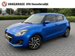 Blauw, metallic lak Gebruikt 2021 Suzuki Swift Style Hatchback | € 18.250 (Eerlijke prijs)