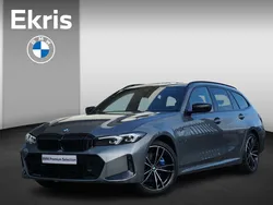 Skyscraper grey metallic (grijs metallic) Gebruikt 2024 BMW 330e Comfort Edition Stationwagen | € 48.900 (Super prijs)