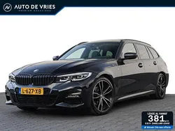 Zwart Gebruikt 2021 BMW 320 Executive Stationwagen | € 28.450 (Goede deal)