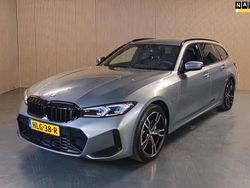 Grijs Gebruikt 2023 BMW 330 Executive Stationwagen | € 41.950 (Eerlijke prijs)