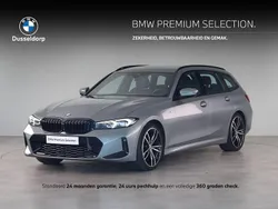 Skyscraper grey metallic (grijs metallic) Gebruikt 2022 BMW 320 Shadowline Stationwagen | € 40.995 (Duur)