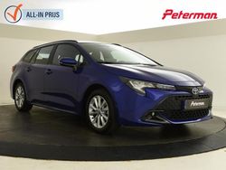 Blauw Gebruikt 2023 Toyota Corolla Hybrid Active Stationwagen | € 26.899 (Eerlijke prijs)