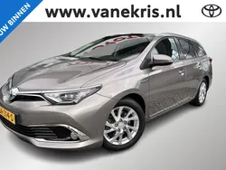 Bruin Gebruikt 2015 Toyota Auris Hybrid Stationwagen | € 14.440 (Iets duurder)