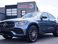 Grijs, metallic lak Gebruikt 2021 Mercedes GLC300e Business Coupé | € 39.995 (Goede deal)