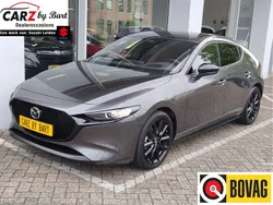 Grijs, metallic lak Gebruikt 2024 Mazda 3 Homura-Line Hatchback | € 26.945 (Eerlijke prijs)