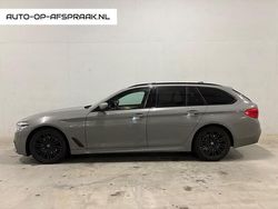 Grijs Gebruikt 2020 BMW 520 Executive Stationwagen | € 29.495 (Eerlijke prijs)