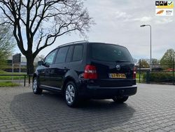 Zwart, metallic lak Gebruikt 2004 VW Touran Highline MPV | € 2.299 (Iets duurder)