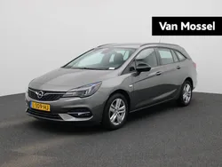 Grijs, metallic lak Gebruikt 2021 Opel Astra Business Edition Stationwagen | € 12.900 (Goede deal)