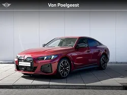 Fire rot metallic (c68) (rood metallic) Gebruikt 2025 BMW i4 Performance Sedan | € 61.900 (Super prijs)