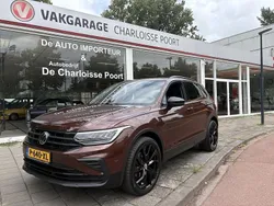 Bruin, metallic lak Gebruikt 2021 VW Tiguan Elegance SUV | € 29.850 (Goede deal)