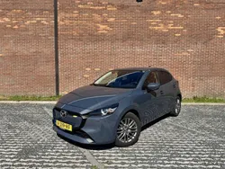 Polymetal grey (grijs metallic) Gebruikt 2024 Mazda 2 Exclusive-Line Hatchback | € 22.845 (Eerlijke prijs)