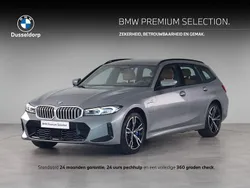 Grijs Gebruikt 2024 BMW 330e M Sport Stationwagen | € 49.950 (Goede deal)
