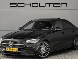 Zwart Gebruikt 2021 Mercedes C180 AMG line Sedan | € 42.900 (Eerlijke prijs)