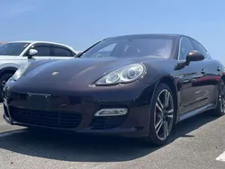 Bruin, metallic lak Gebruikt 2009 Porsche Panamera Turbo Sedan | € 39.900