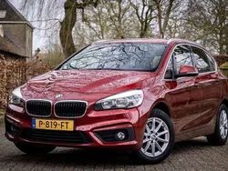 Rood, metallic lak Gebruikt 2014 BMW 218 Active Tourer Executive MPV | € 10.950 (Iets duurder)