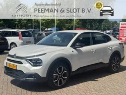 Wit, metallic lak Gebruikt 2023 Citroën e-C4 Feel Sedan | € 22.950 (Eerlijke prijs)